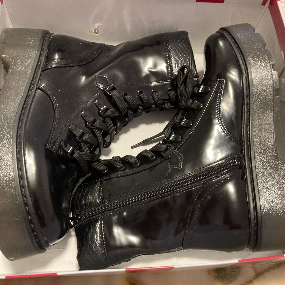 Saw Edelman circus sanders black boots